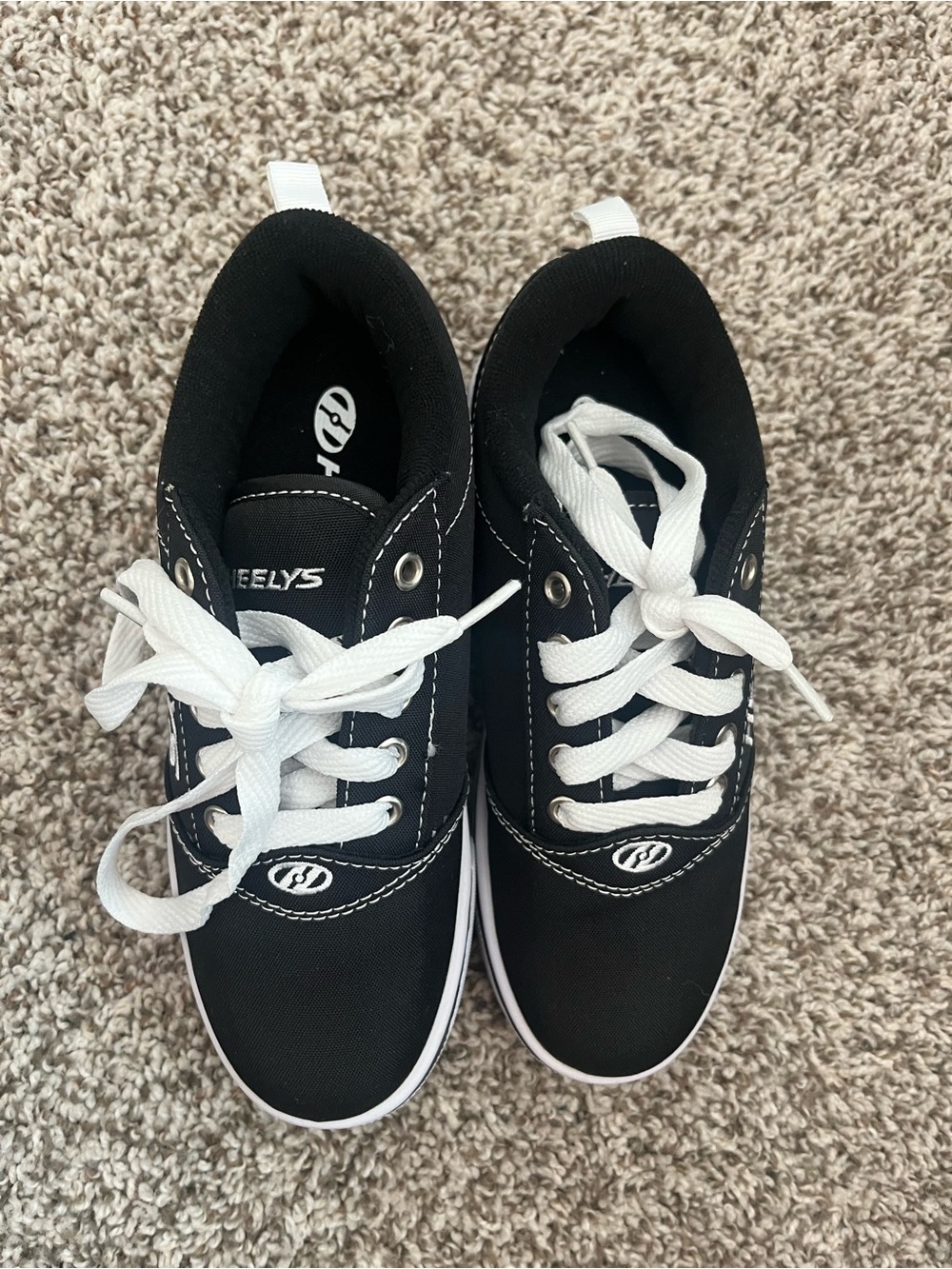 New in box Heely’s black skate shoes size 3